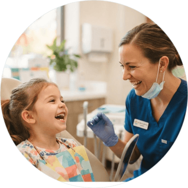 Child smiling during a dental visit
